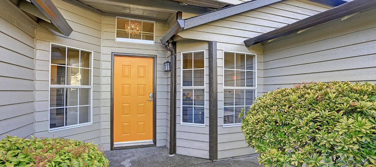 Yellow Beige and White Outside Wall